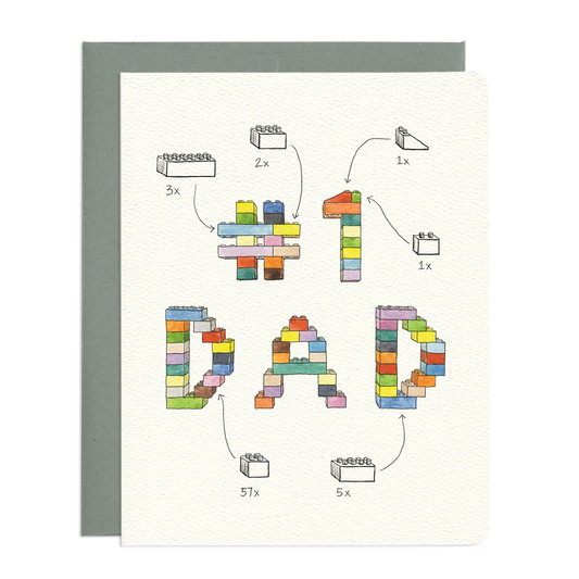 A creative card design featuring colorful LEGO blocks arranged to spell '#1 DAD' with assembly instructions.