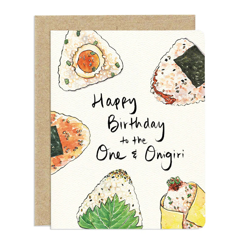 This is a watercolor illustration of a birthday card featuring various onigiri, or Japanese rice balls. The text on the card reads "Happy Birthday to the One & Onigiri."