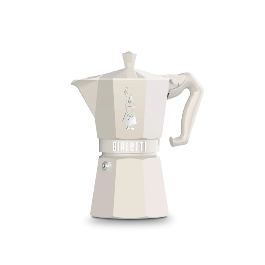 Cream coloured Bialetti coffee maker on a white background