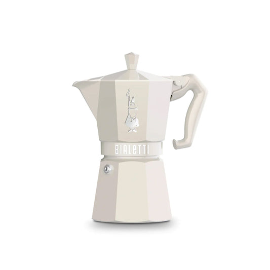 Cream coloured Bialetti coffee maker on a white background