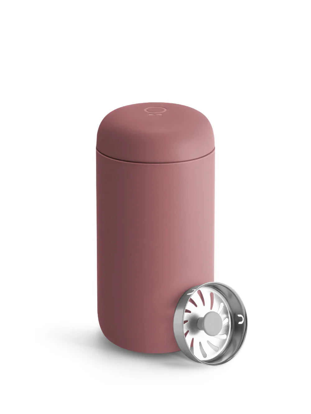 Pink travel mug with silver lid on a white background